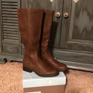 Below the knee brown boots